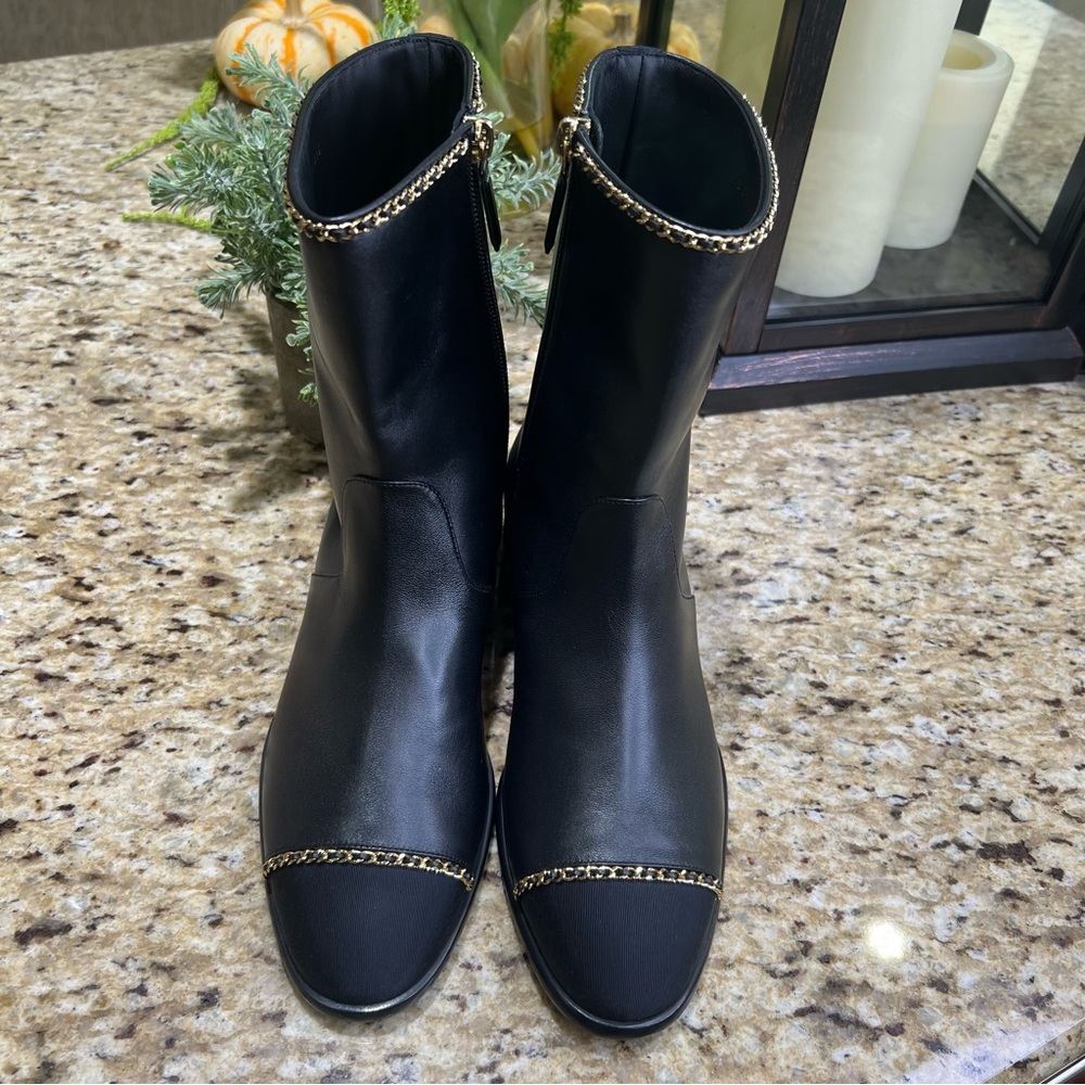 CHANEL Black Ankle Boots with Gold Accents